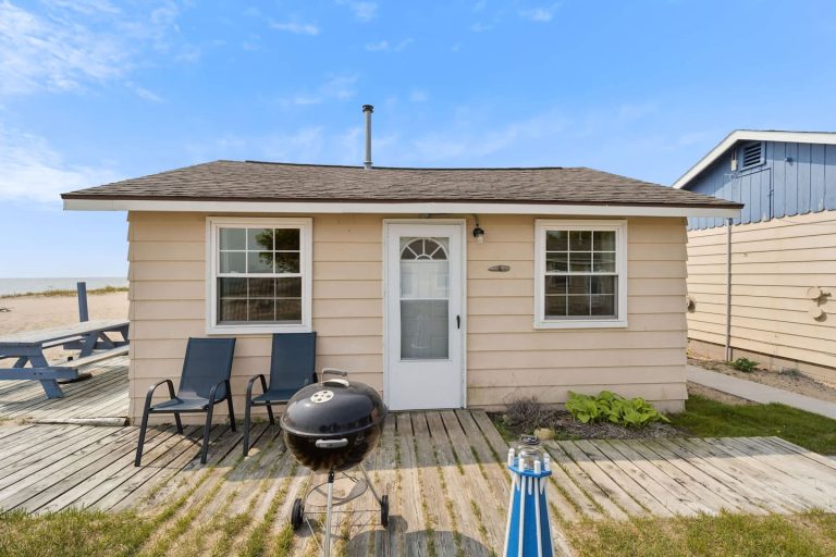 Exterior of a beachfront rental Cabin in Oscoda, Michigan — Barefoot Beach Cabin #4, hosted by Roam