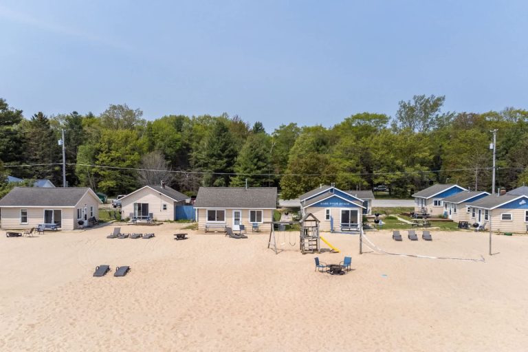 Cottage row from the beach Cabin in Oscoda, Michigan — Barefoot Beach Cabin #7, hosted by Roam